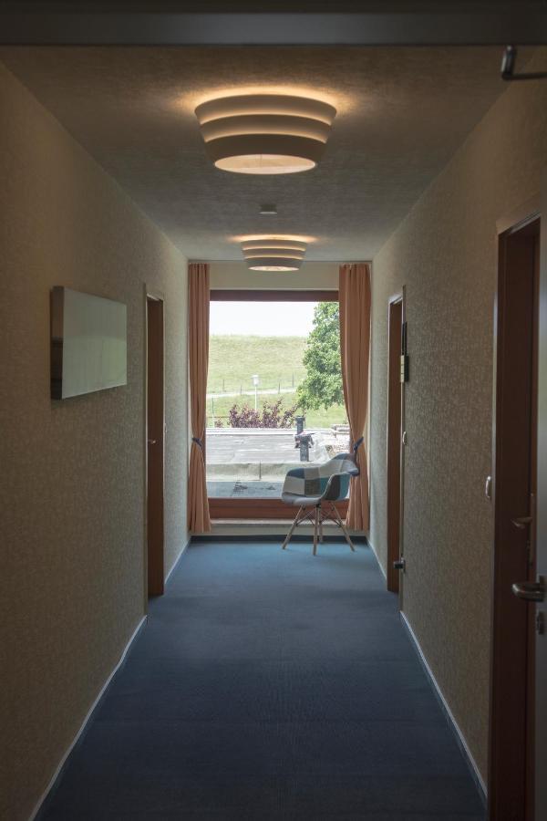 Hotel Am Friesenstrand ทอสเซินส์ ภายนอก รูปภาพ
