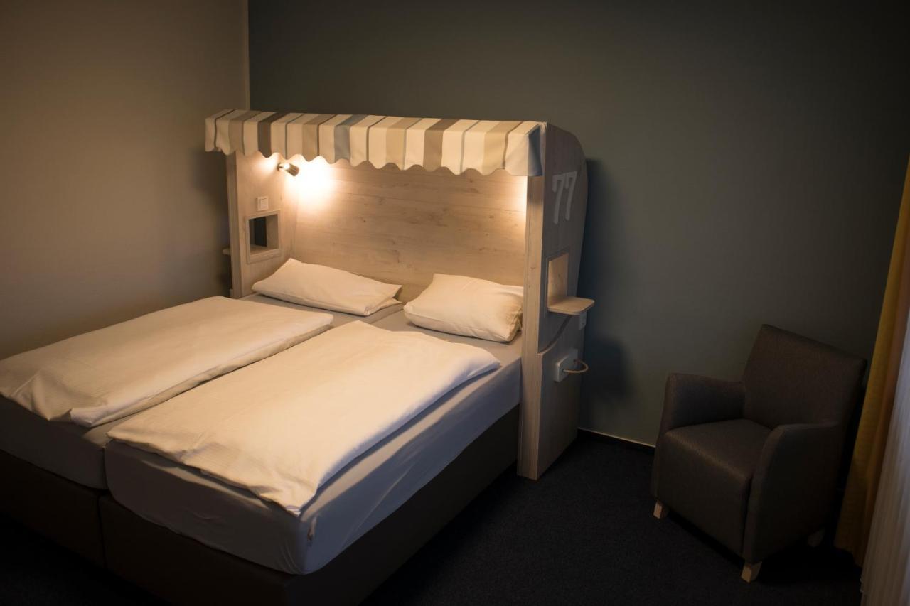 Hotel Am Friesenstrand ทอสเซินส์ ภายนอก รูปภาพ